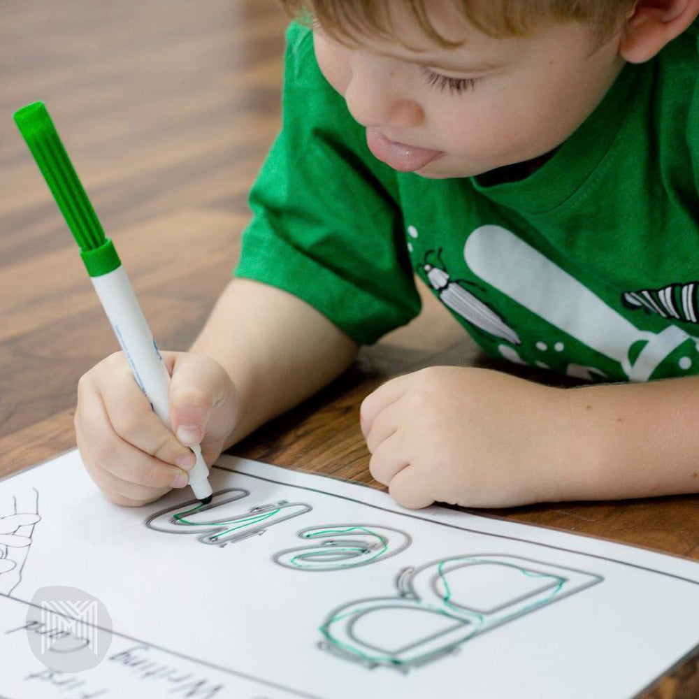 Little boy tracing and drawing with Baby markers. Washable felt markers - toddler art supplies