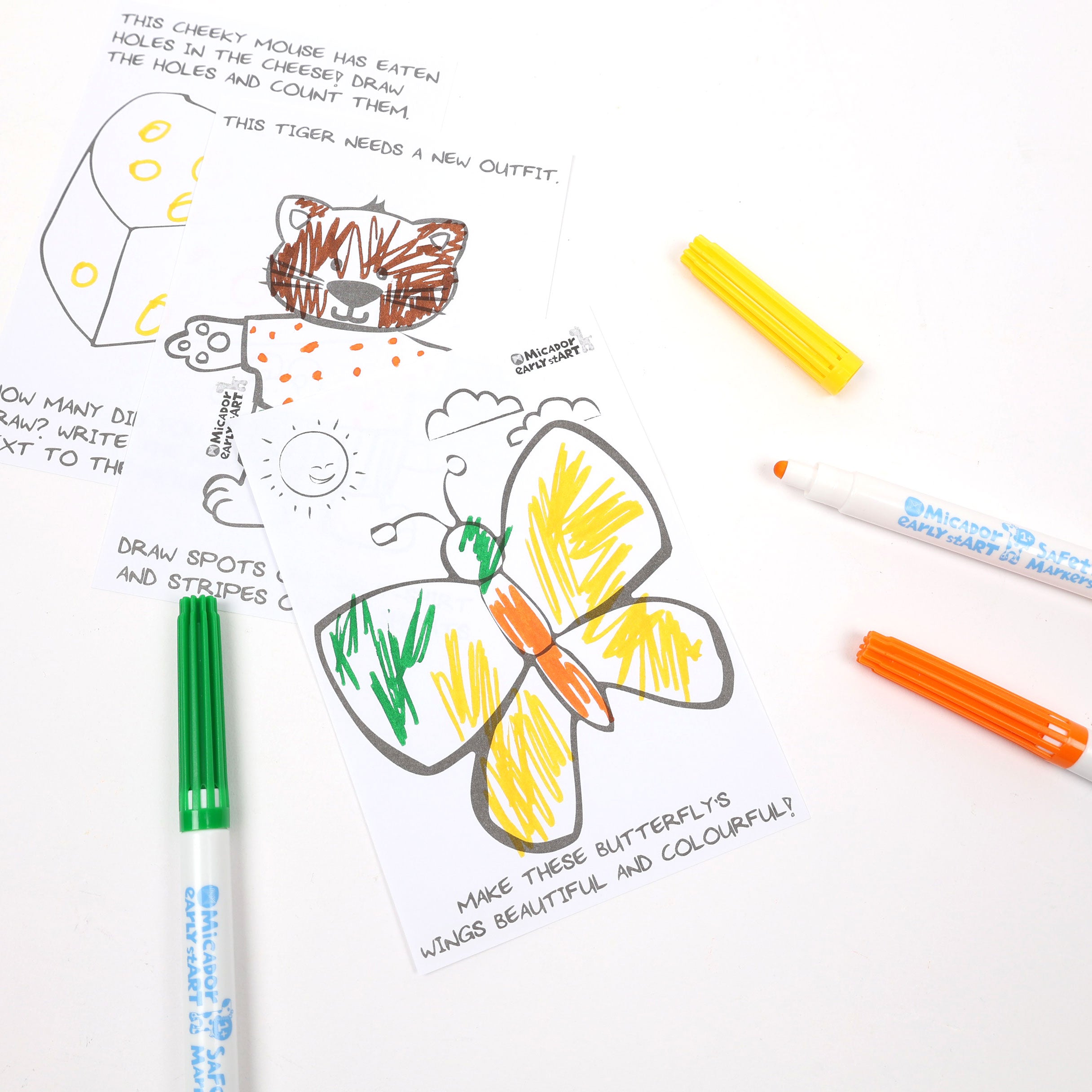 Baby felt pens coloring in a butterfly. Safe and non-toxic art supplies for baby first gift