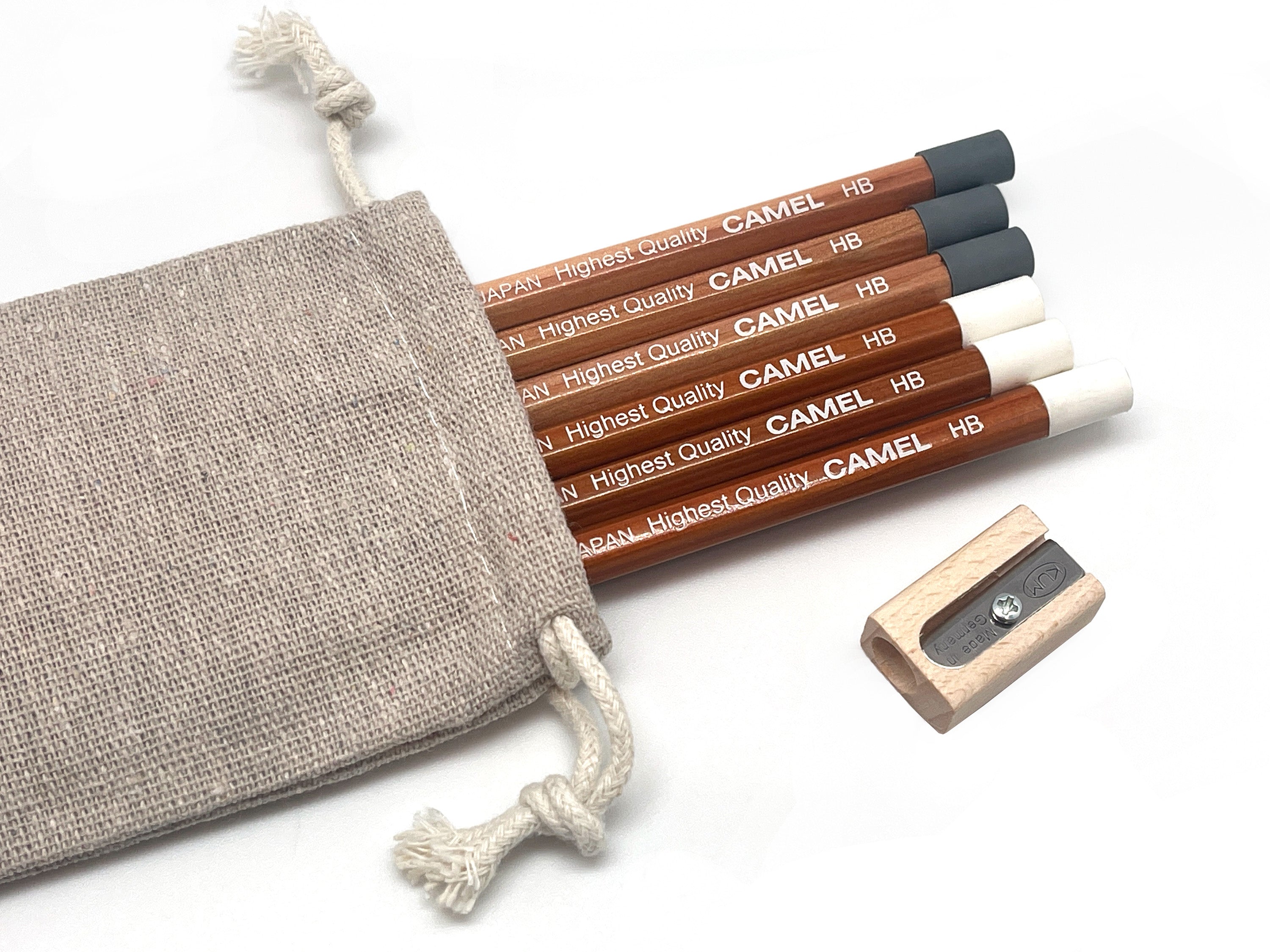 Camel HB Graphite pencils with a sharpener and linen pouch on a white background