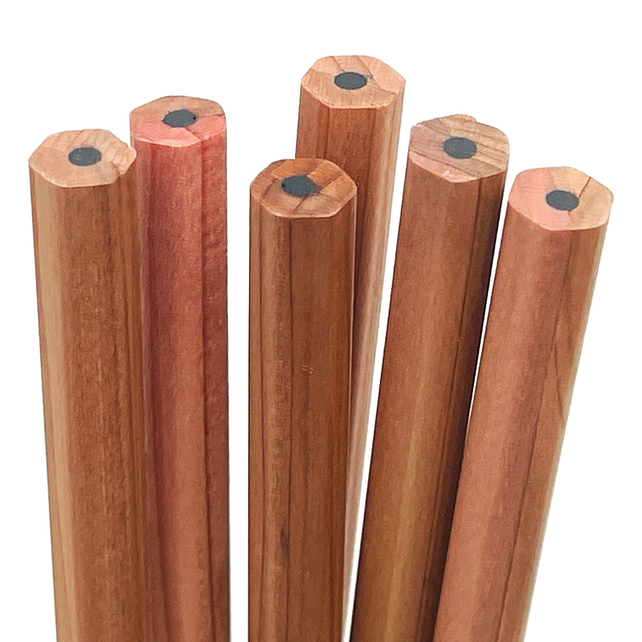 Set of eco friendly cedar wooden pencils with graphite tips on a white background