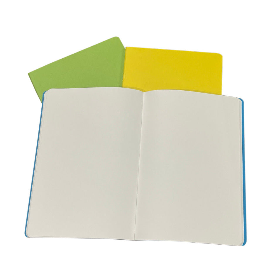 Fabriano noteooks size A5 on a table with one open showing the blank pages