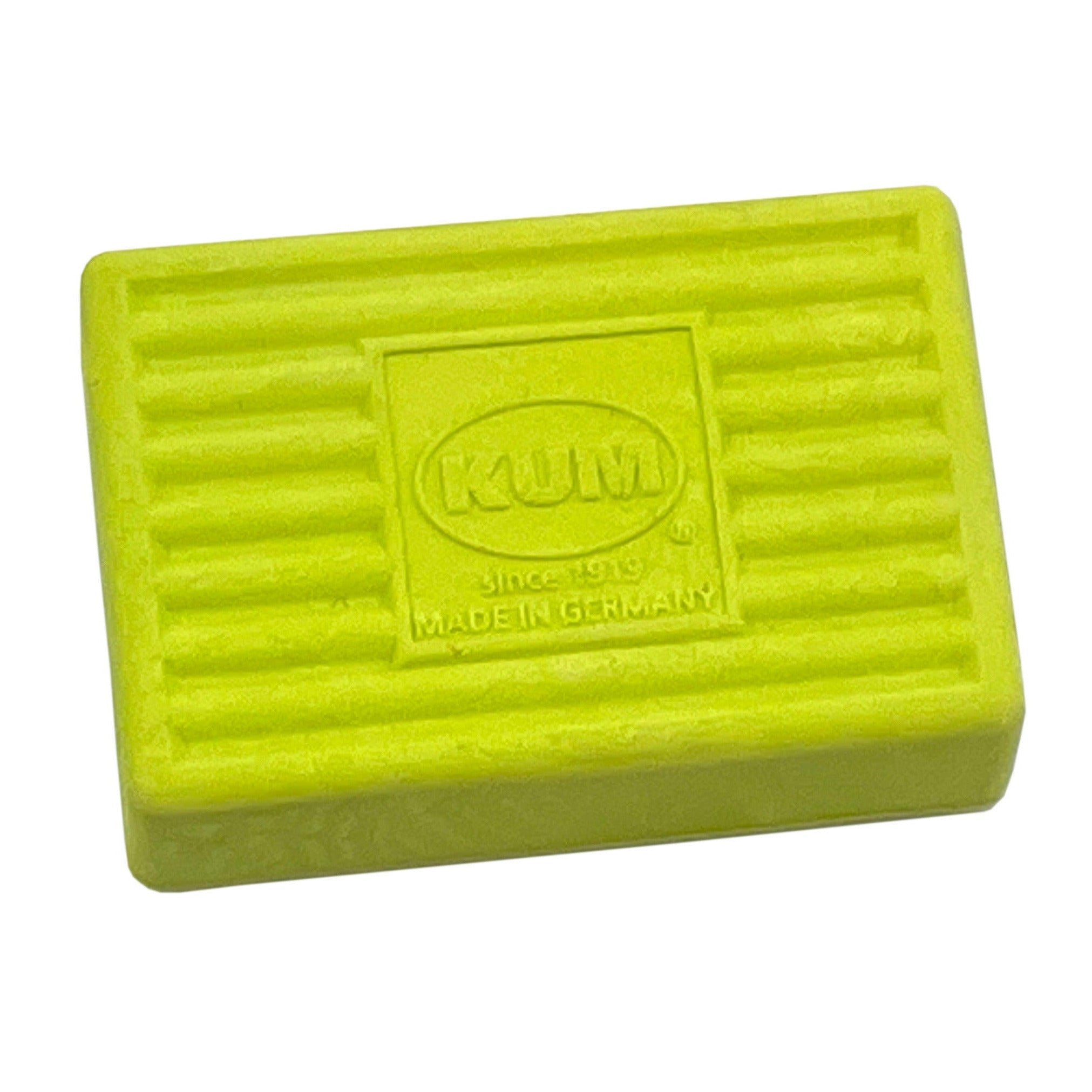 Lime green KUM eraser on a white background