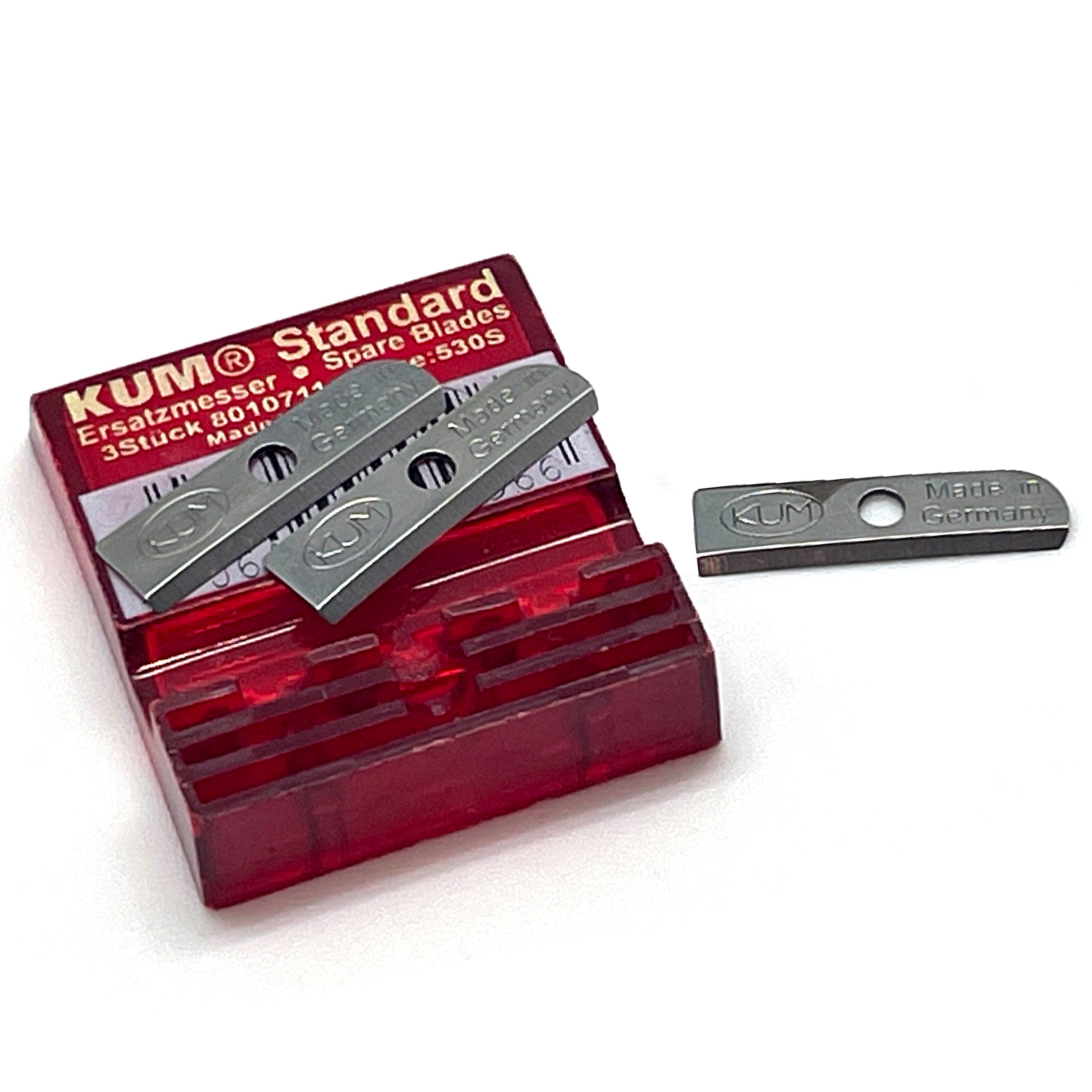 KUM standard spare blades with red transparent case on a white background