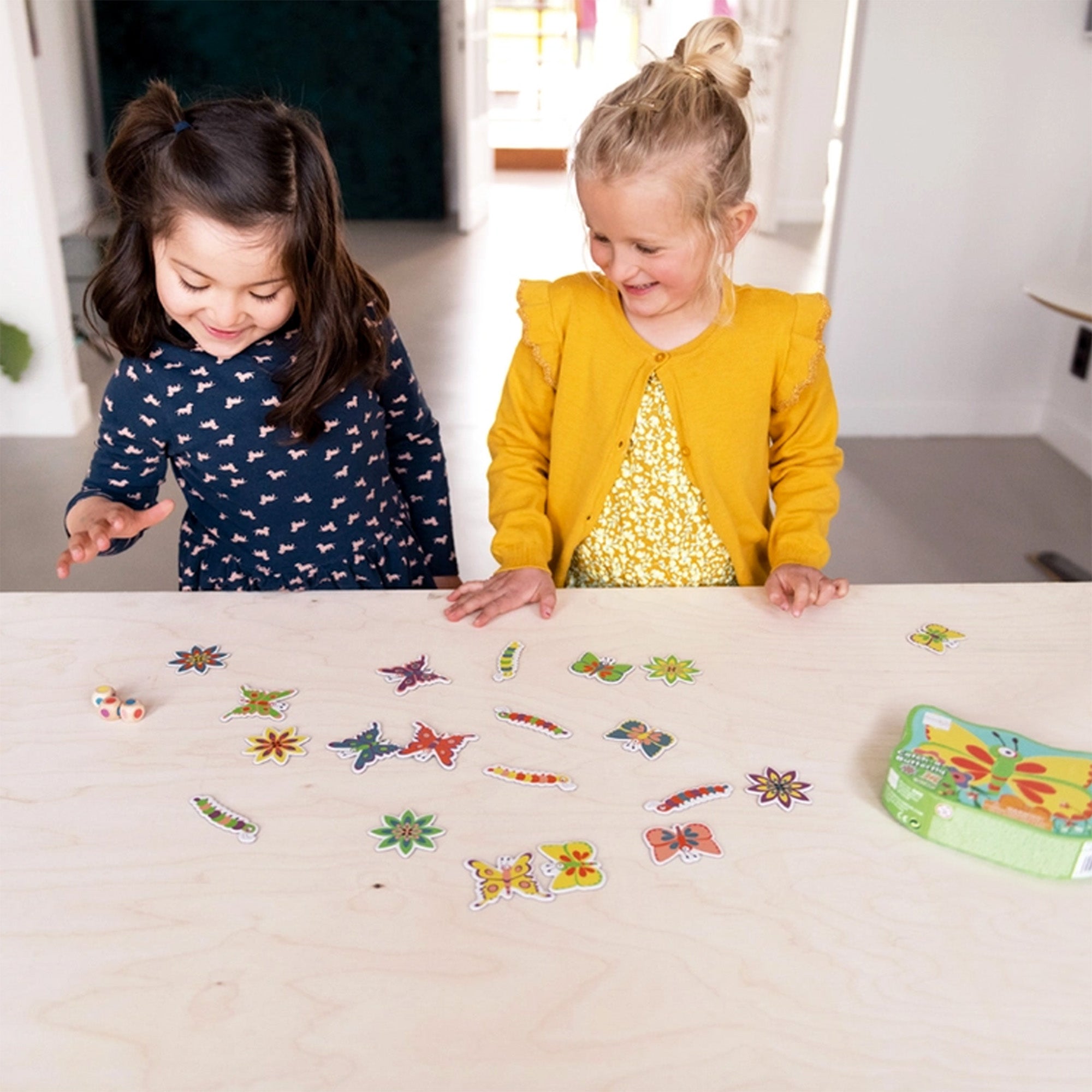 Kids playing the butterfly matching game