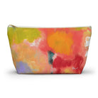 Art on the Go! A colorful floral-patterned zipper pouch with a rectangular shape and a visible brand logo on the front.