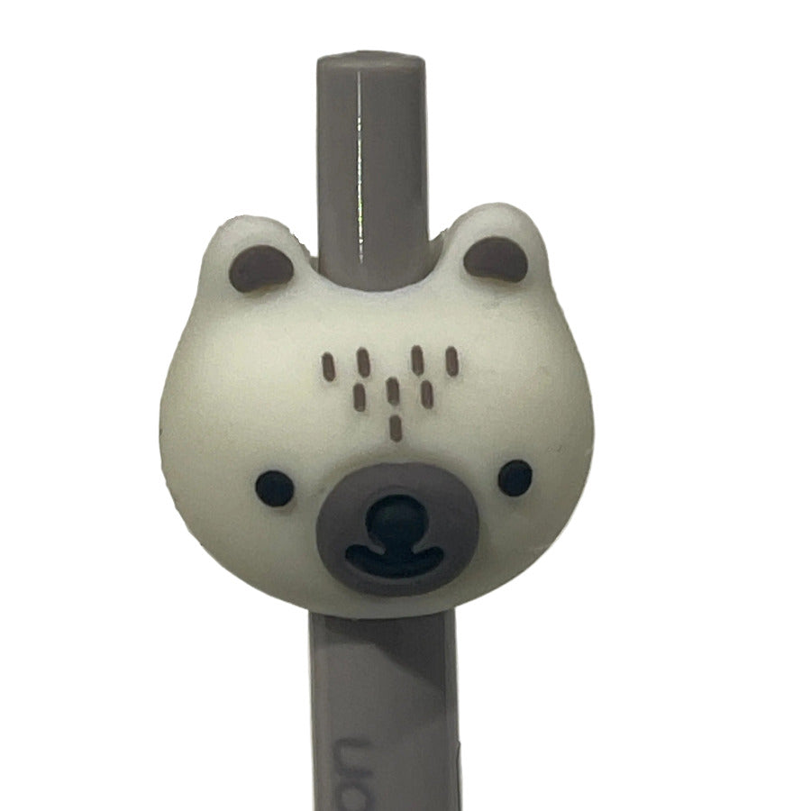 Close up of a cream color bear gel pen