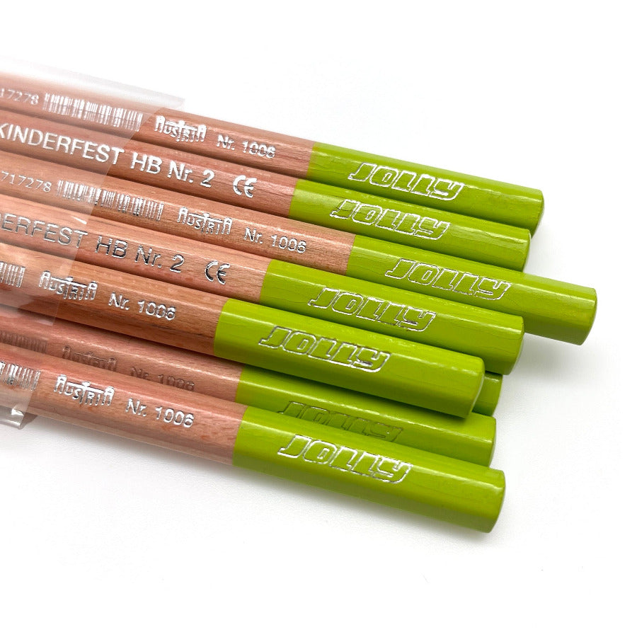 Detail photo of 12 Jolly Kinderfest graphite pencils with bright green tops and the Jolly logo, HB, the CE non-toxic certification mark and Austria. Pencils are packaged in a clear cello bag against a white background