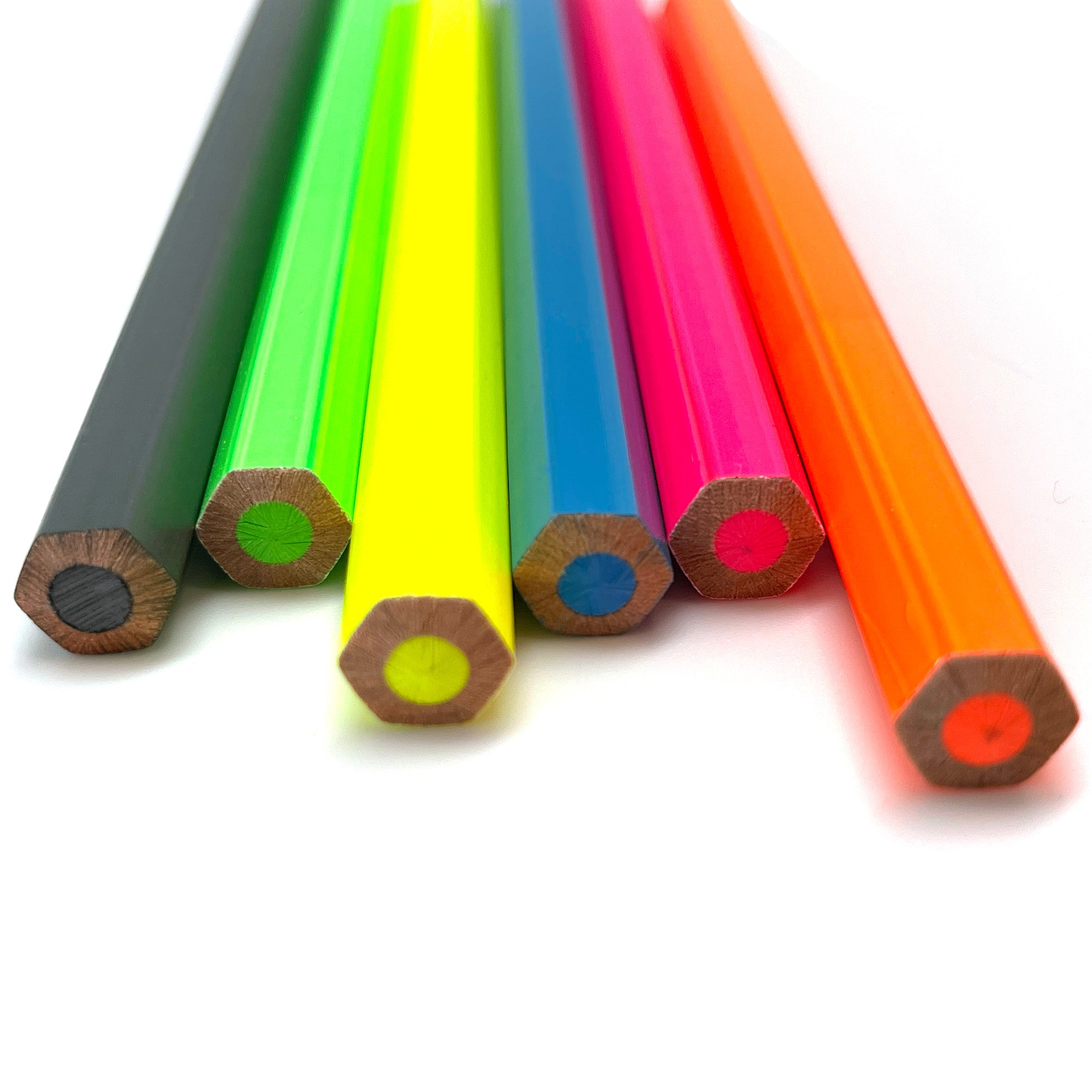 Set of colorful jumbo pencil ends on a white background