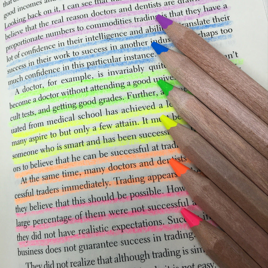 Set of pencils highlighters from Stubby Pencil Studio showing how they can highlight thin pages without leaking or bleeding.