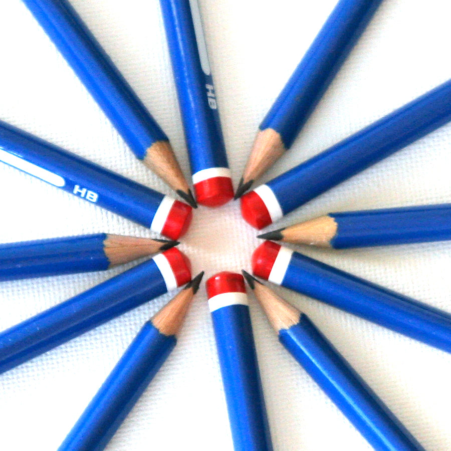 Triangular HB graphite pencils with blue finish and red dipped cap (no eraser).