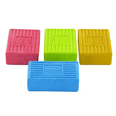 A set of KUM brick-shaped erasers in pink, green, yellow, and blue colors.