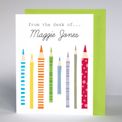 Personalized stationery cards with colorful pencil illustrations and from the desk of... the name 'Maggie Jones' printed at the top.