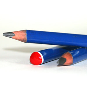 the detail end caps of the jumbo triangular shape graphite pencil showing the red and bright blue finish against a white background.