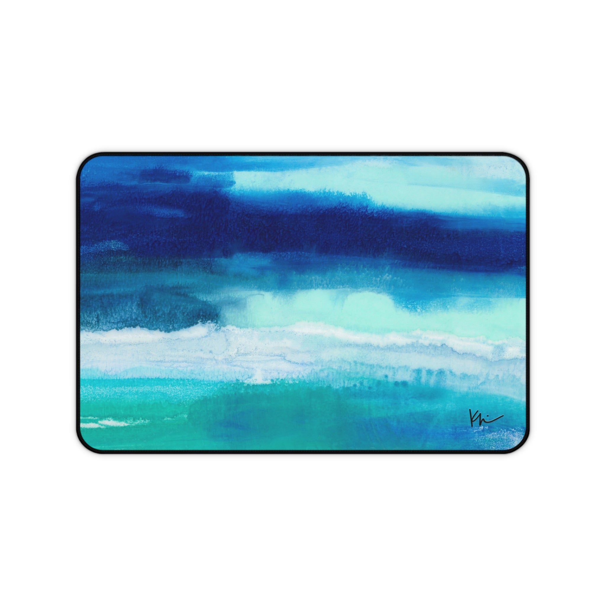 Desk mat with soothing blue hues inspired by the ocean. 