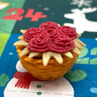 Red and gold flowers in a basket mini eraser on a colorful Christmas Advent Calendar