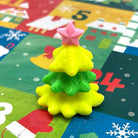Colorful Christmas tree mini eraser on a colorful Christmas Advent Calendar