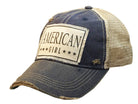 Blue baseball cap with American Girl patch on a white background