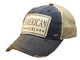Blue baseball cap with American Girl patch on a white background