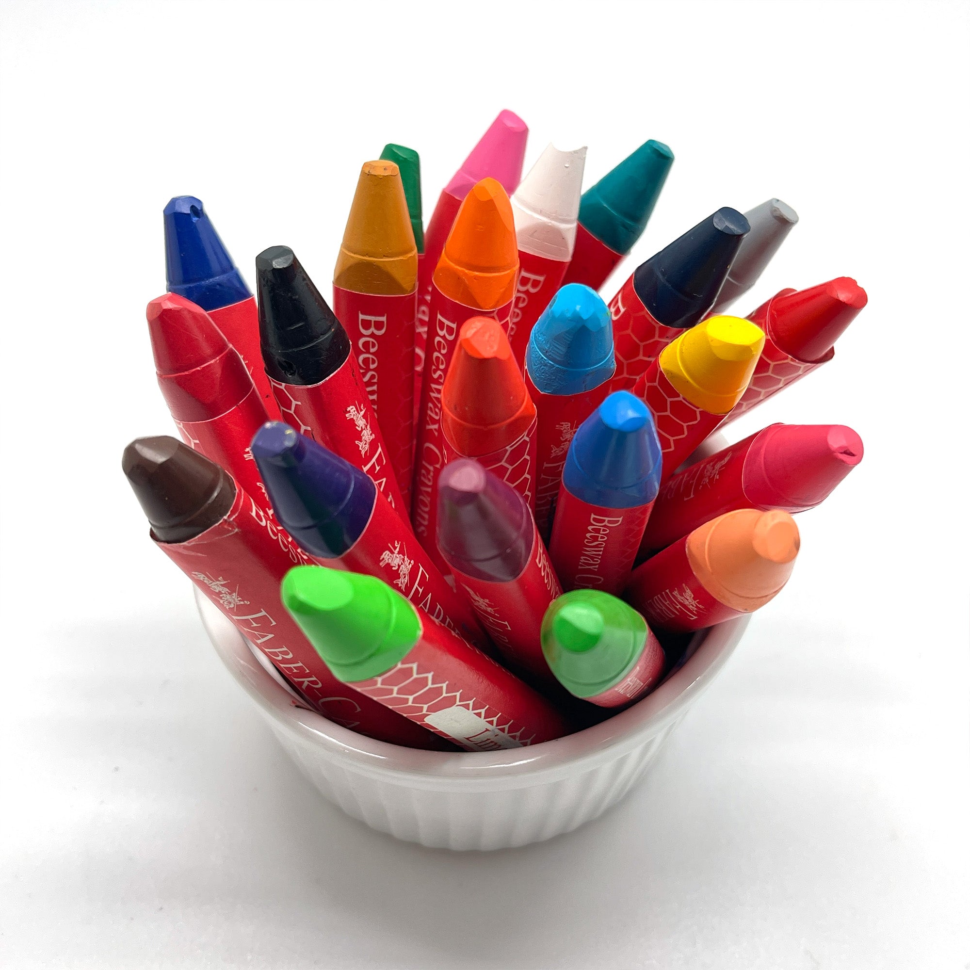 Eco-Friendly Beeswax Crayons in a white container. Triangular Jumbo Beeswax Crayons Easy Grip for Children in assorted colors