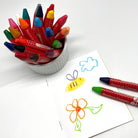 Beeswax Crayons in a white container next to a drawing of a bee and flower. Triangular Jumbo Beeswax Crayons Easy Grip for Children
