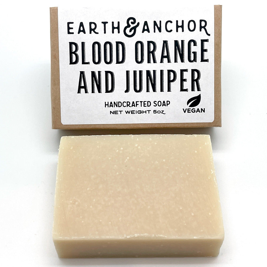 Blood Orange and Juniper handmade soap against white background