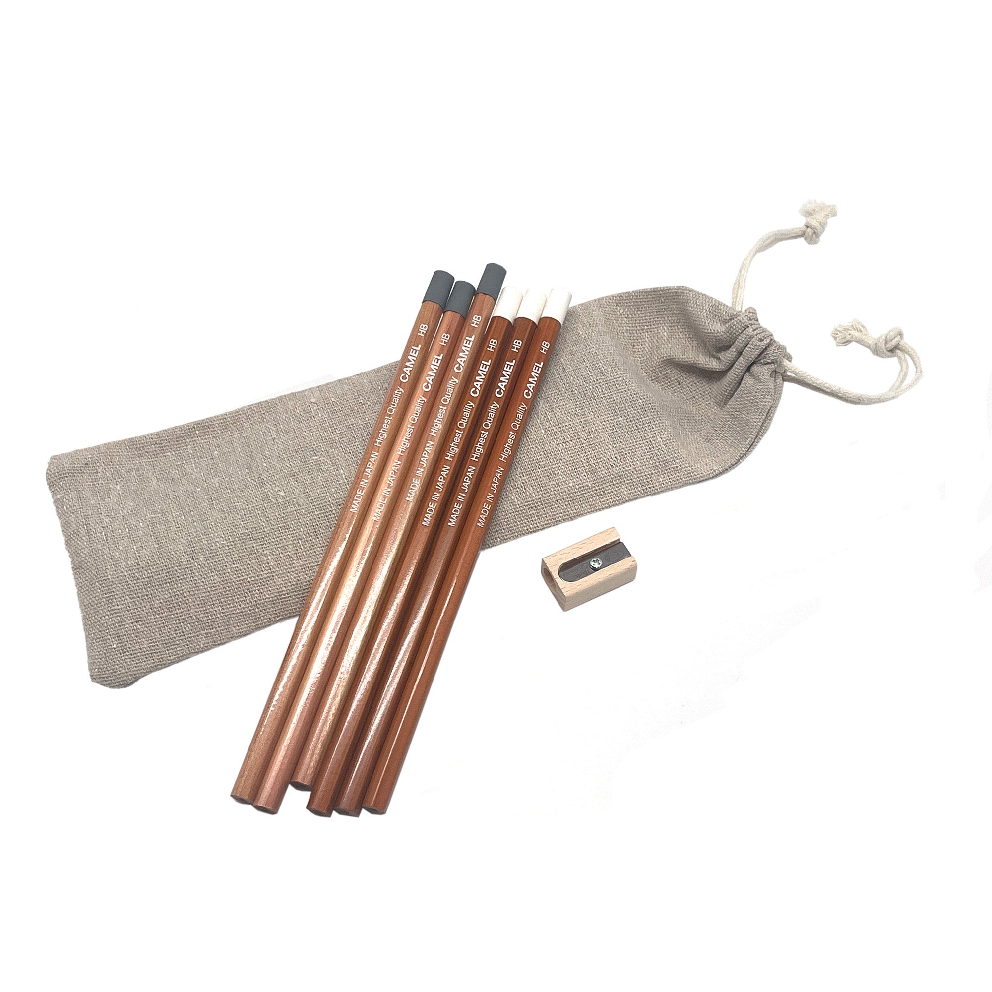 Set of Camel HB Graphite pencils with a pencil sharpener and linen pouch on a white background
