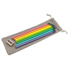 Set of colorful Camel HB Graphite pencils on a fabric pouch with a sharpener on a white background