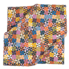 A square scarf featuring a colorful geometric patchwork pattern of triangles and squares in many shades, including pink, blue, yellow, orange, brown, green, and white. A small black label with the brand name 'Handker' is visible in the bottom right corner, set against a plain white background.