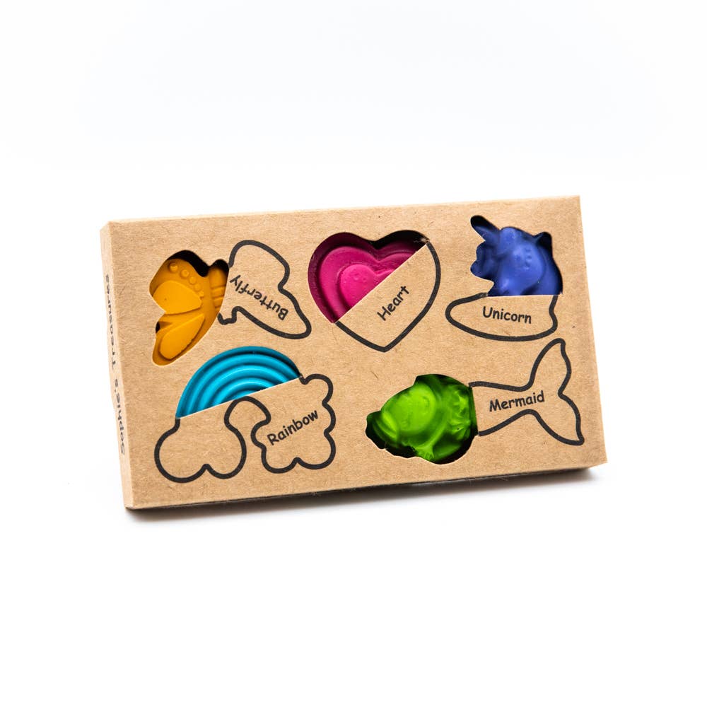 A variety of colorful crayons in different shapes including a heart, a fish, a rainbow, and a mermaid tail, displayed in an eco-friendly packaging.