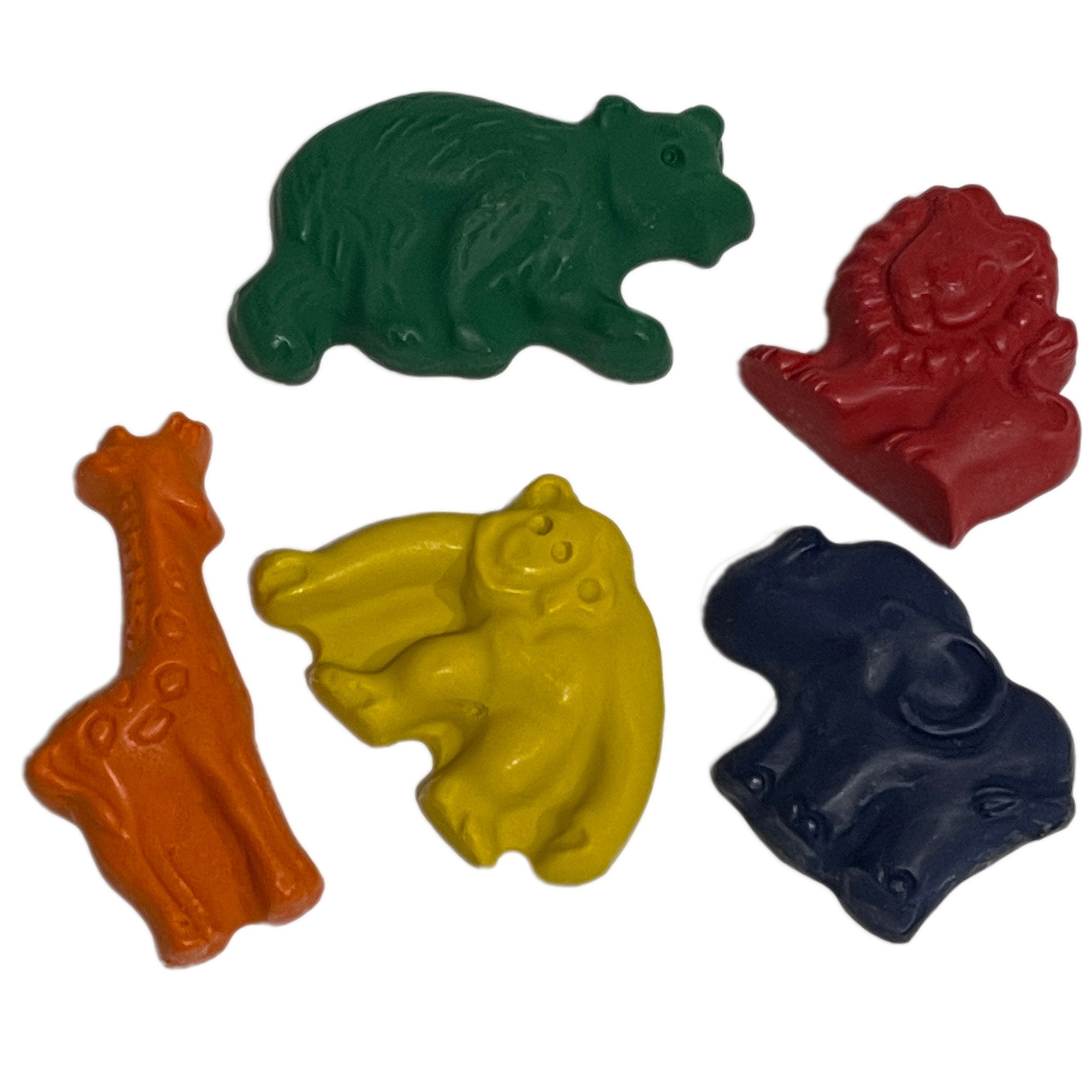 A set of animal-shaped crayons including green hippopotamus, red lion, orange giraffe, yellow monkey, and blue elephant.