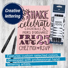 Pink paper with hand-lettered text, Faber-Castell artist pens, and promotional text on a wooden surface.