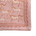 close up detail of Pink cotton bandana  with horse patterns and decorative western border