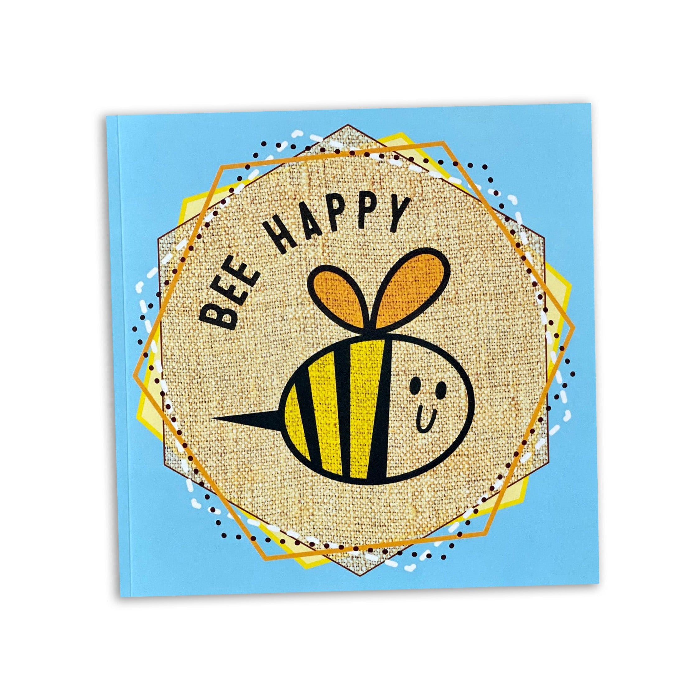 Sketchbook with a bee illustration and 'Bee Happy' text on a blue background