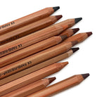 A set of Lyra Color-Giant skin tone jumbo size colored pencils with natural wood barrels arranged diagonally on a white background.