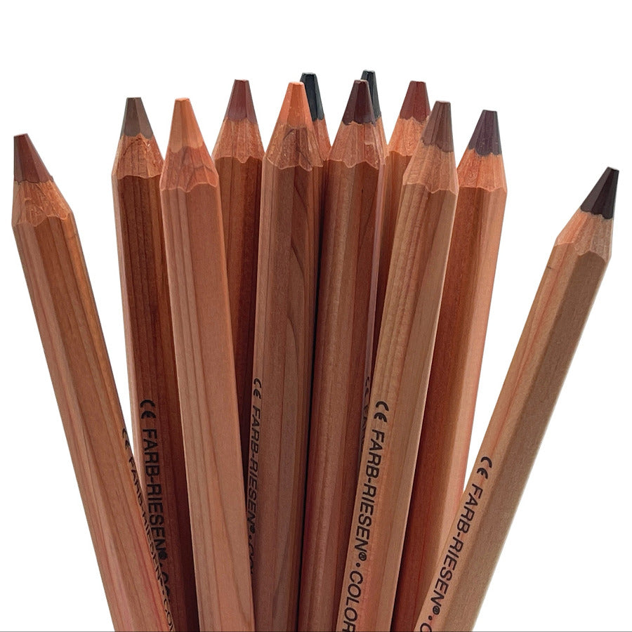 A group of Lyra Color-Giant Jumbo colored pencils with skin tone color tips
isolated on a white background.