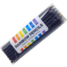 A set of black pencils with multicolored tips representing a rainbow, with the tips sharpened to show the rainbow core.