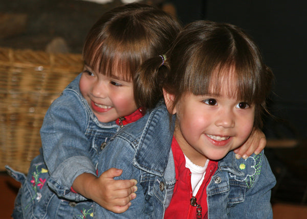 Picture of two toddler girls happy, healthy and smiling