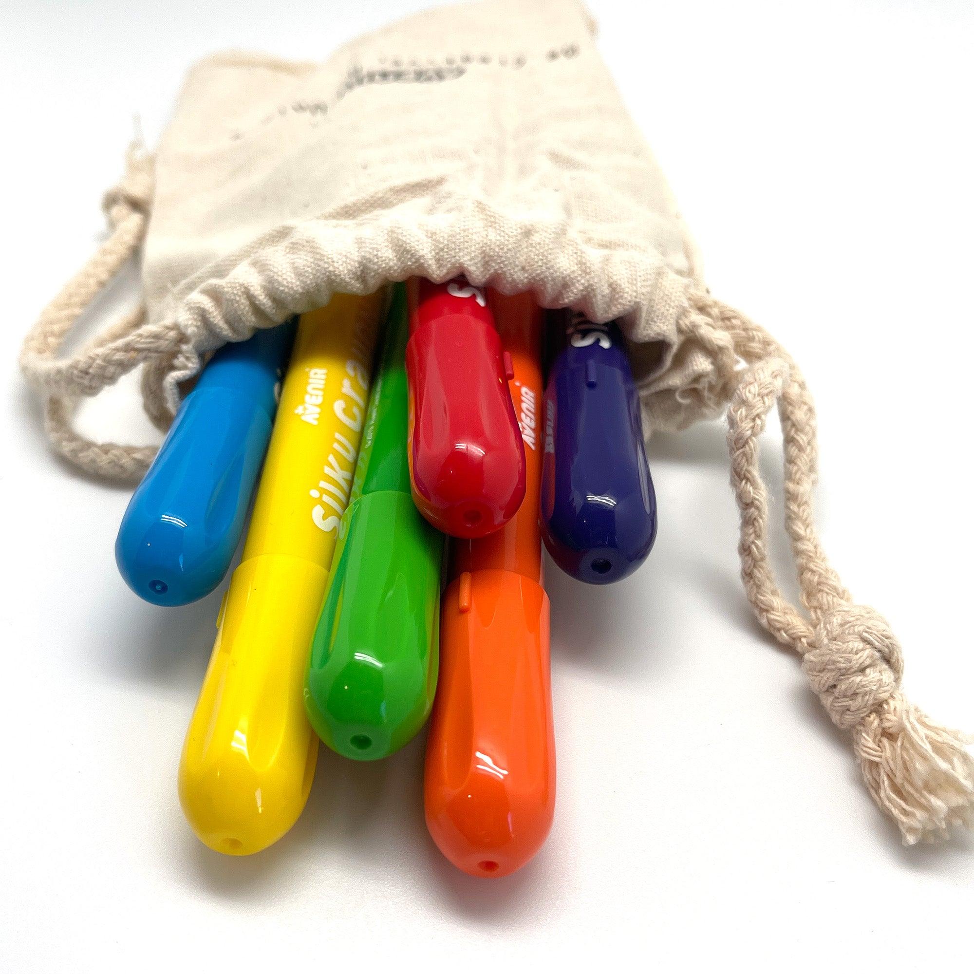 set of colorful silky watercolor crayons in a bag