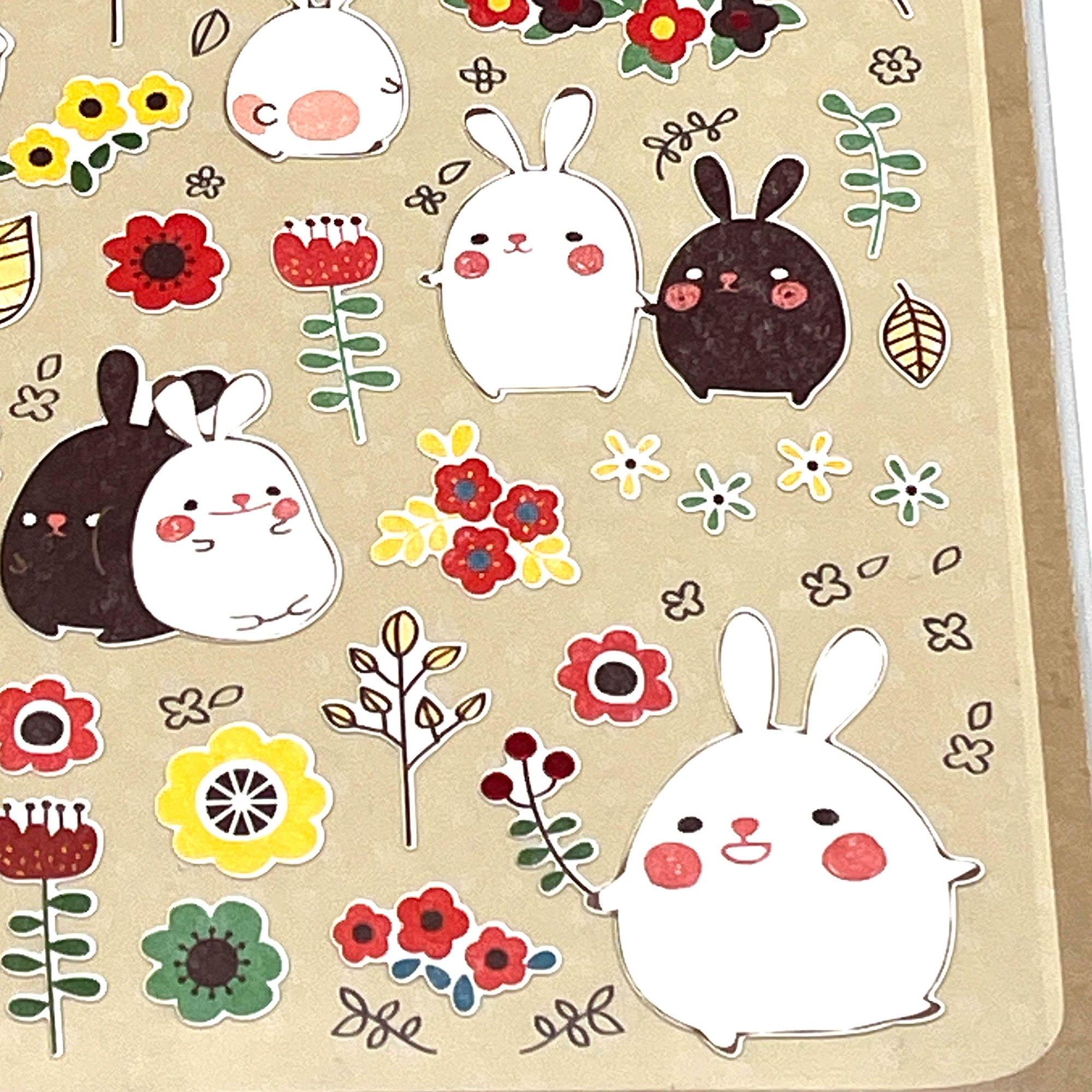 A sheet of colorful bunny theme stickers featuring various stylized rabbits and floral designs.
