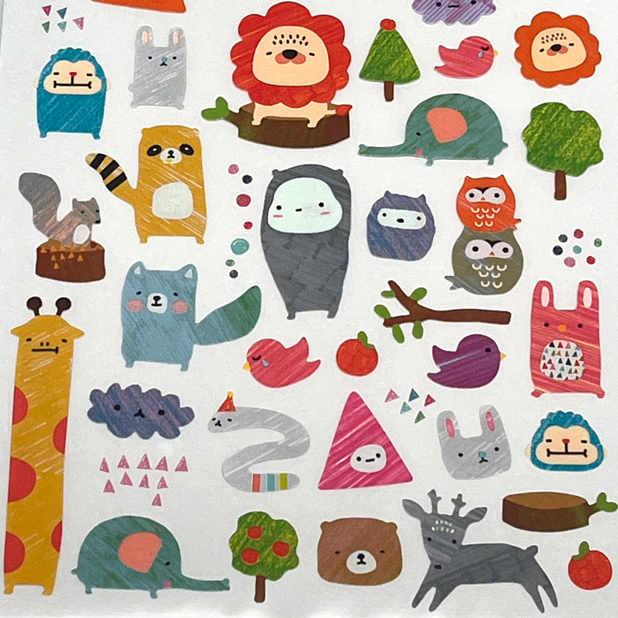 A sheet of colorful animal stickers including illustrations of a giraffe, monkey, lion, and various other animals.