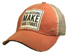 Orange cap with a mesh back and a patch that reads 'Bad decisions make good stories' on a white background.