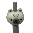 Close up of a cream color bear gel pen 