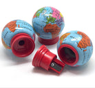Several globe-shaped pencil sharpeners with a colorful world map print and red plastic bases, shown on a white background with one open sharpener in front.