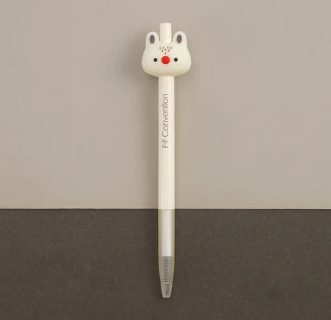 Kawaii style bunny gel pen on a light tan background