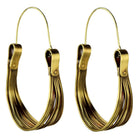 Pair of handmade hoop earrings brass boho jewelry on a white background