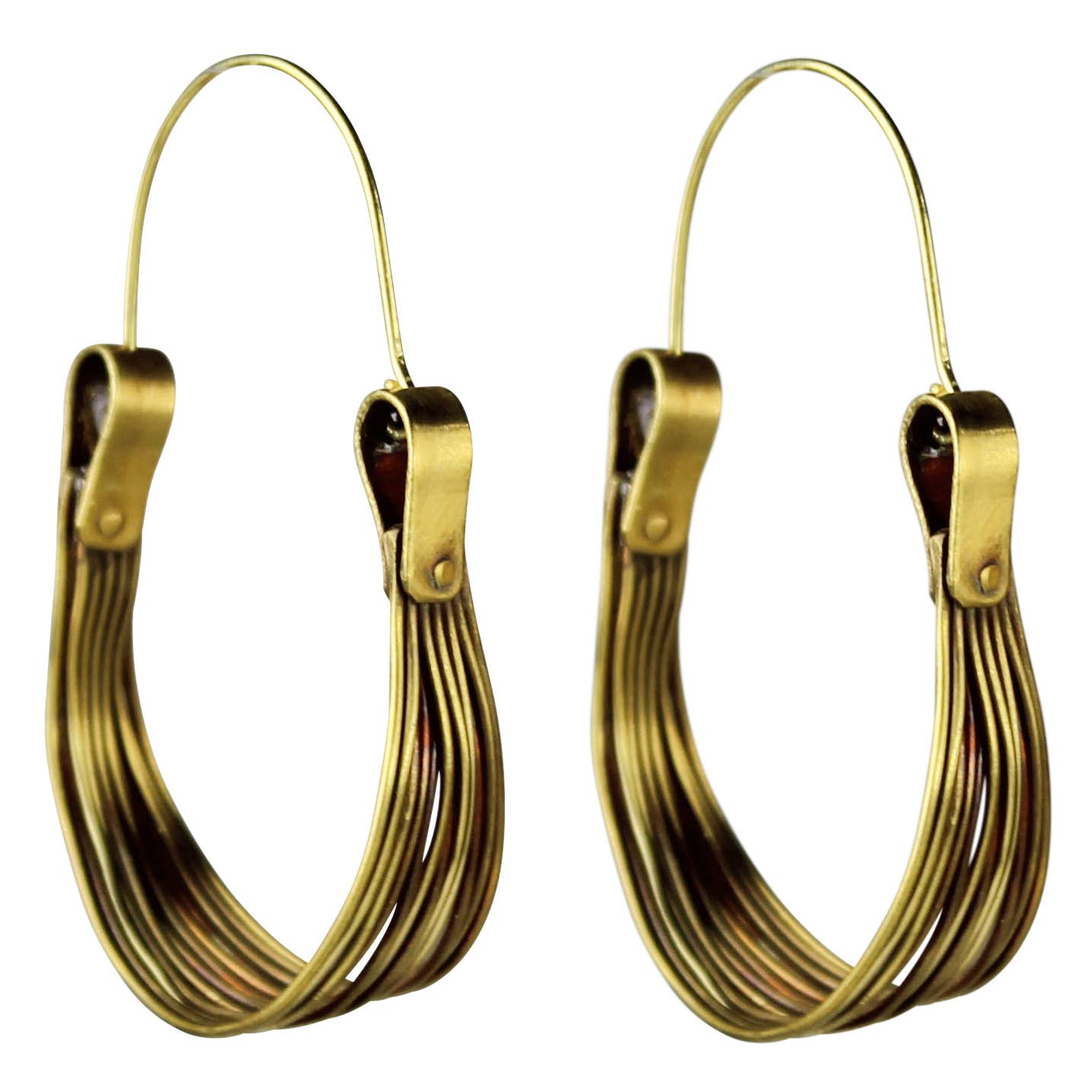 Pair of handmade hoop earrings brass boho jewelry on a white background