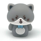 A small kawaii styled grey and white cat pencil sharpener shown on a plain white background.