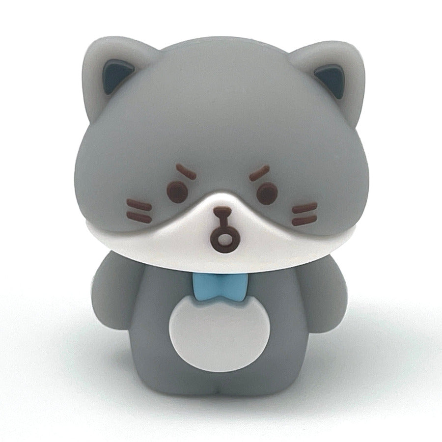 A small kawaii styled grey and white cat pencil sharpener shown on a plain white background.