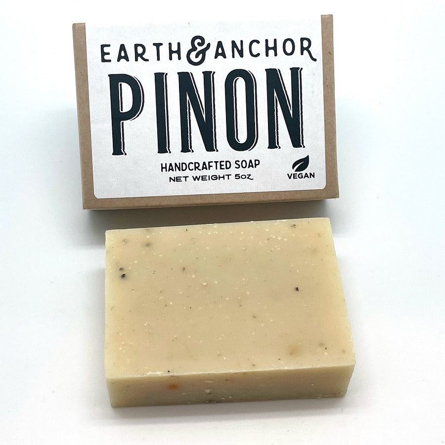 Earth & Anchor Pinon handcrafted soap bar with packaging on a white background