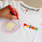 Drawing with a fabric marker on a shirt